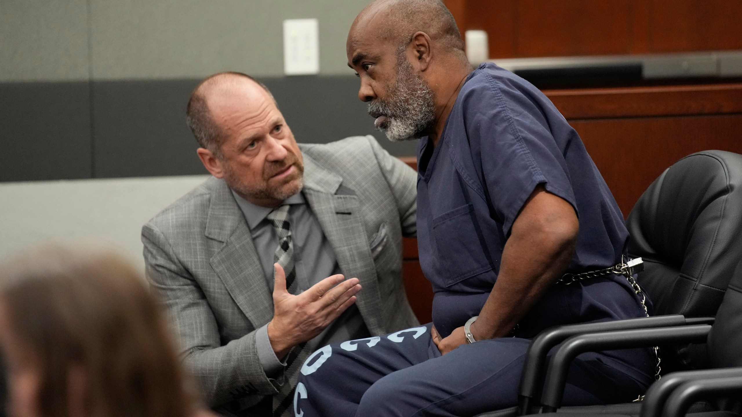 Duane "Keffe D" Davis, right, speaks with attorney Ross Goodman in court Thursday, Oct. 19, 2023, in Las Vegas. Davis has been charged with killing Tupac Shakur in 1996. (AP Photo/John Locher, Pool)