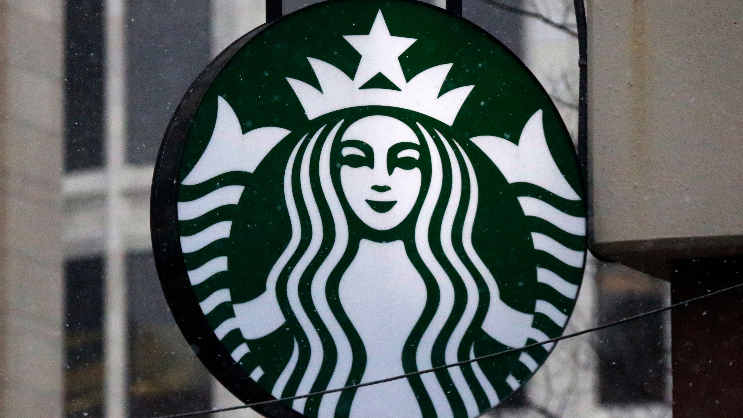 FILE - This Tuesday, March 14, 2017, file photo shows the Starbucks logo on a shop in downtown Pittsburgh. Starbucks reports earnings on Thursday, Nov. 2, 2023. (AP Photo/Gene J. Puskar, File)